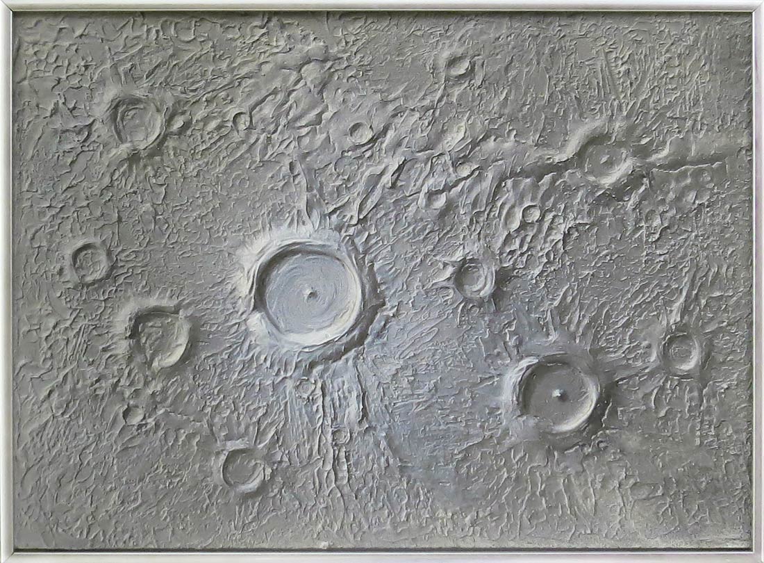 Grey moon landscape with craters.